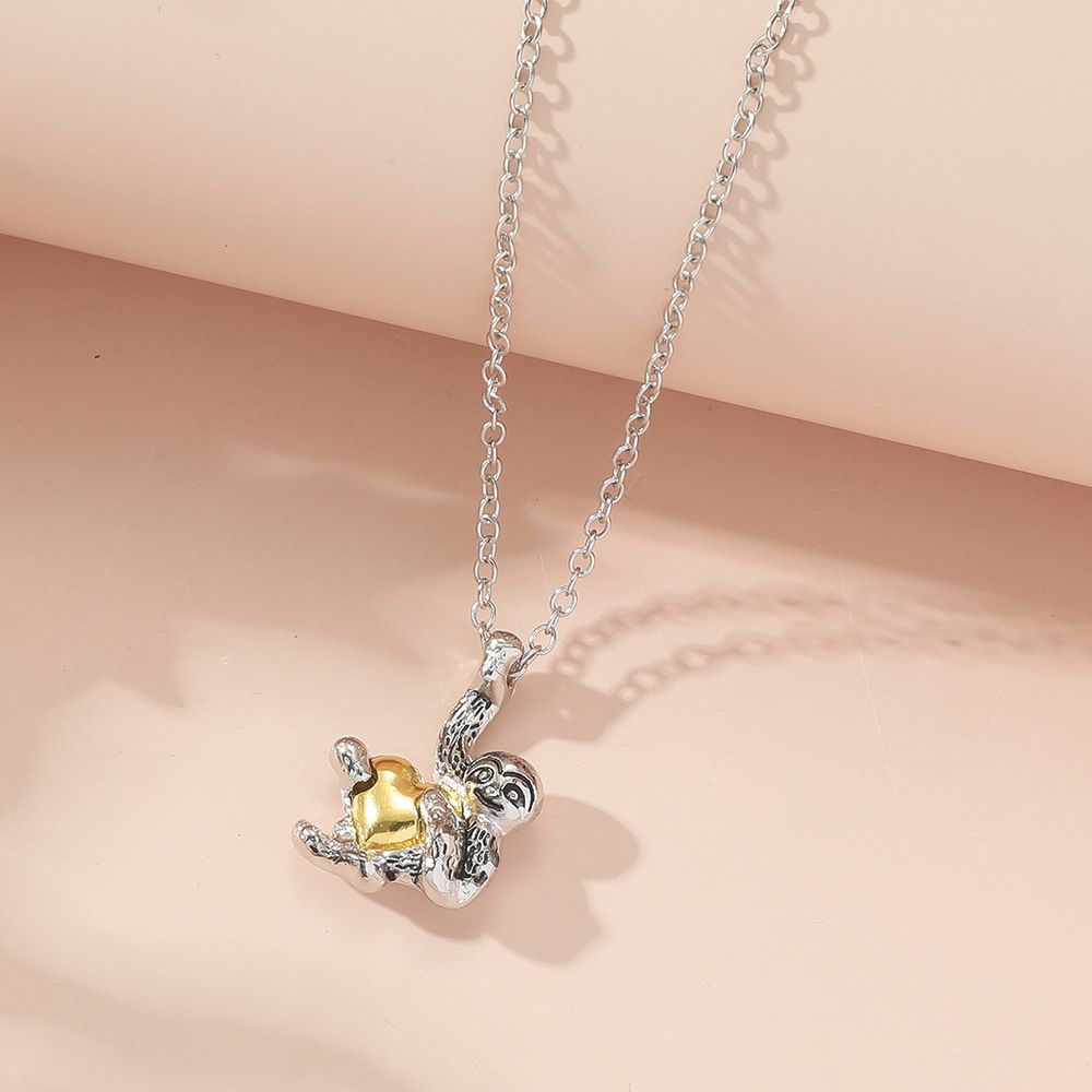HEART HUGGING SLOTH NECKLACE - Alonna's Legging Land