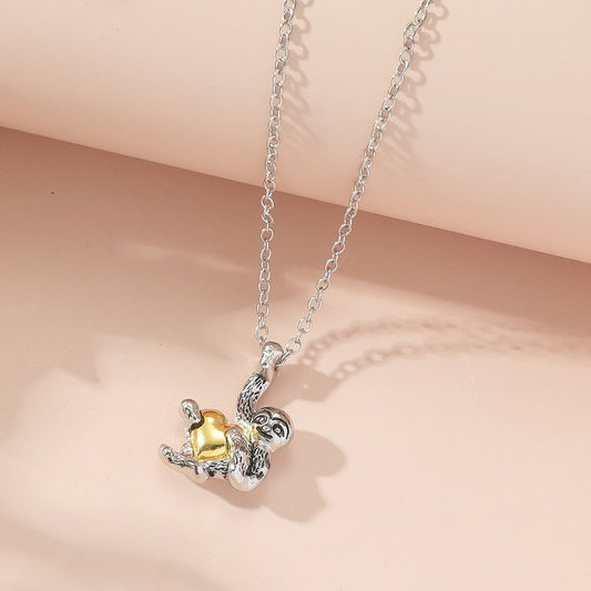 HEART HUGGING SLOTH NECKLACE - Alonna's Legging Land