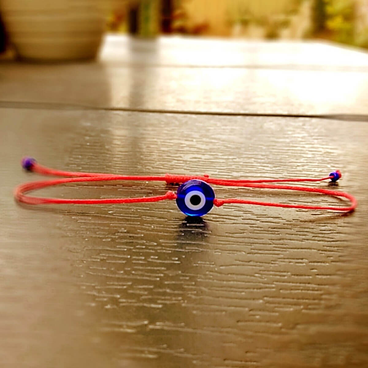 SIMPLISTIC EVIL EYE BRACELET (ADJUSTABLE)